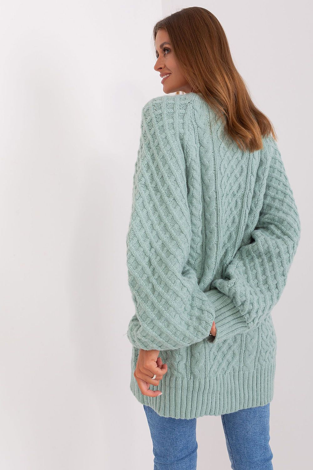 Sumptuous oversized long sweater in variegated acrylic fabric by AT, ideal as a short dress, exuding comfort and refined style.