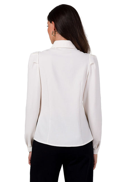 Versatile BeWear long sleeve shirt displayed on a mannequin, ideal for both casual and formal events.