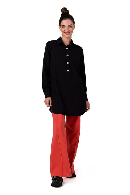 The BeWear tunic's front pocket detail, offering a blend of practicality and elegance in its luxurious design.