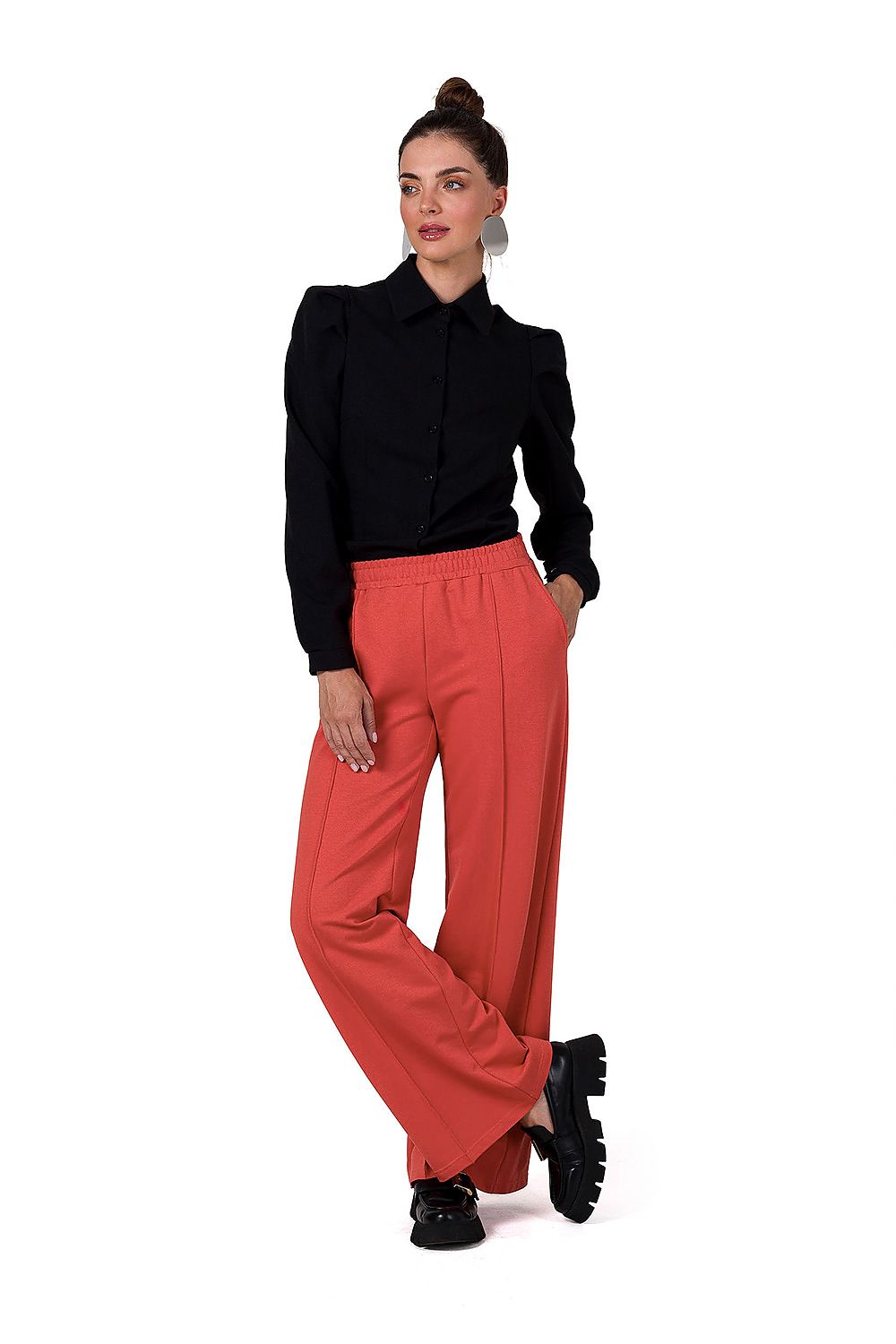 Fashion-forward BeWear Women's Wide Leg Trousers, featuring a luxurious elastic waistband, spacious side pockets, and a contemporary wide-leg design.