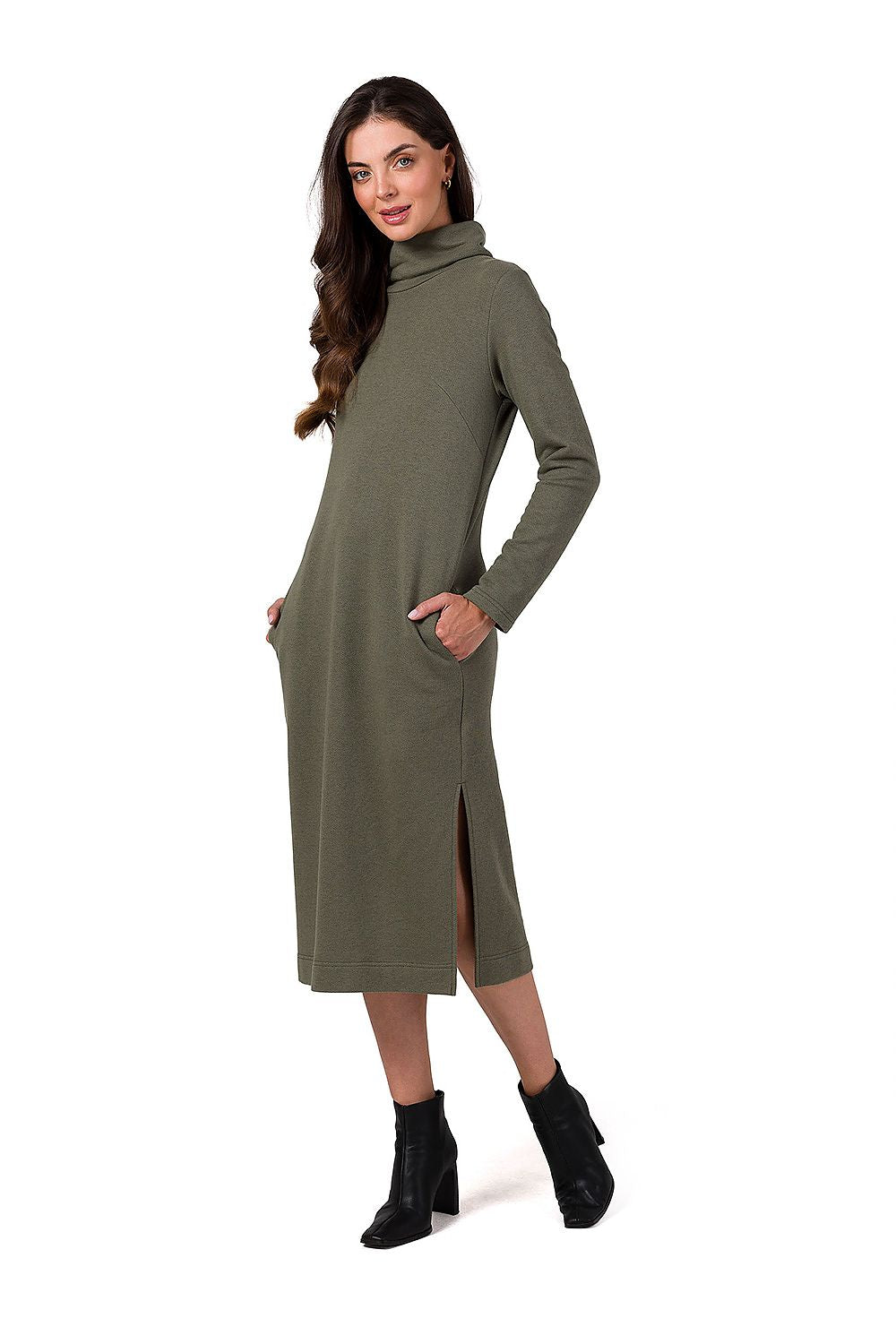 Elegant midi dress by BeWear showcasing structured cotton knit fabric, long sleeves, and practical side pockets, perfect for sophisticated outings.