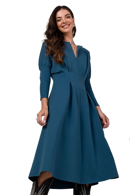 Elegant BeWear Day Dress featuring batwing sleeves, pockets, and a split neckline, showcasing unique Polish design in luxurious soft knit fabric.