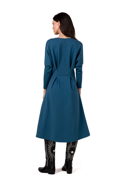 Unique Polish designed BeWear Day Dress showcasing side pockets, a flattering waist, and a flowing skirt for sophisticated comfort.