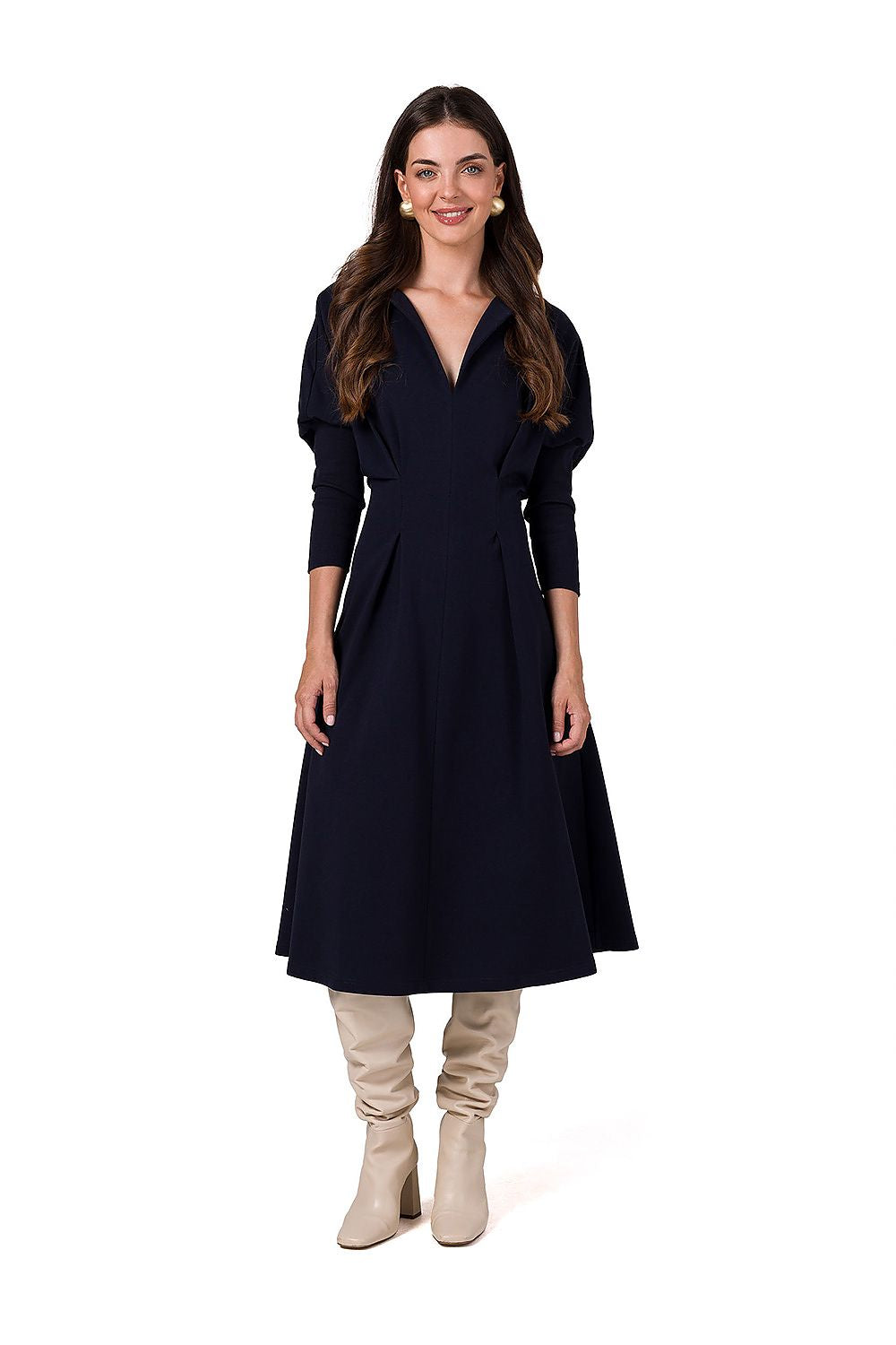 BeWear Day Dress in elegant style with long batwing sleeves and a soft textured finish, perfect for refined occasions.