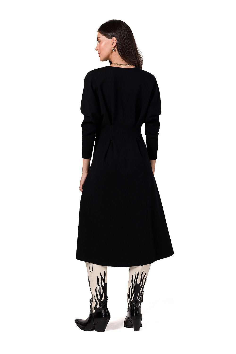 Close-up of the luxurious fabric of the BeWear dress, highlighting the soft knit and delicate stitching for a polished look.