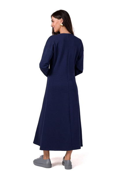 Sophisticated BeWear knitted dress, designed with a deep V neckline and long tapered sleeves for a timeless look.
