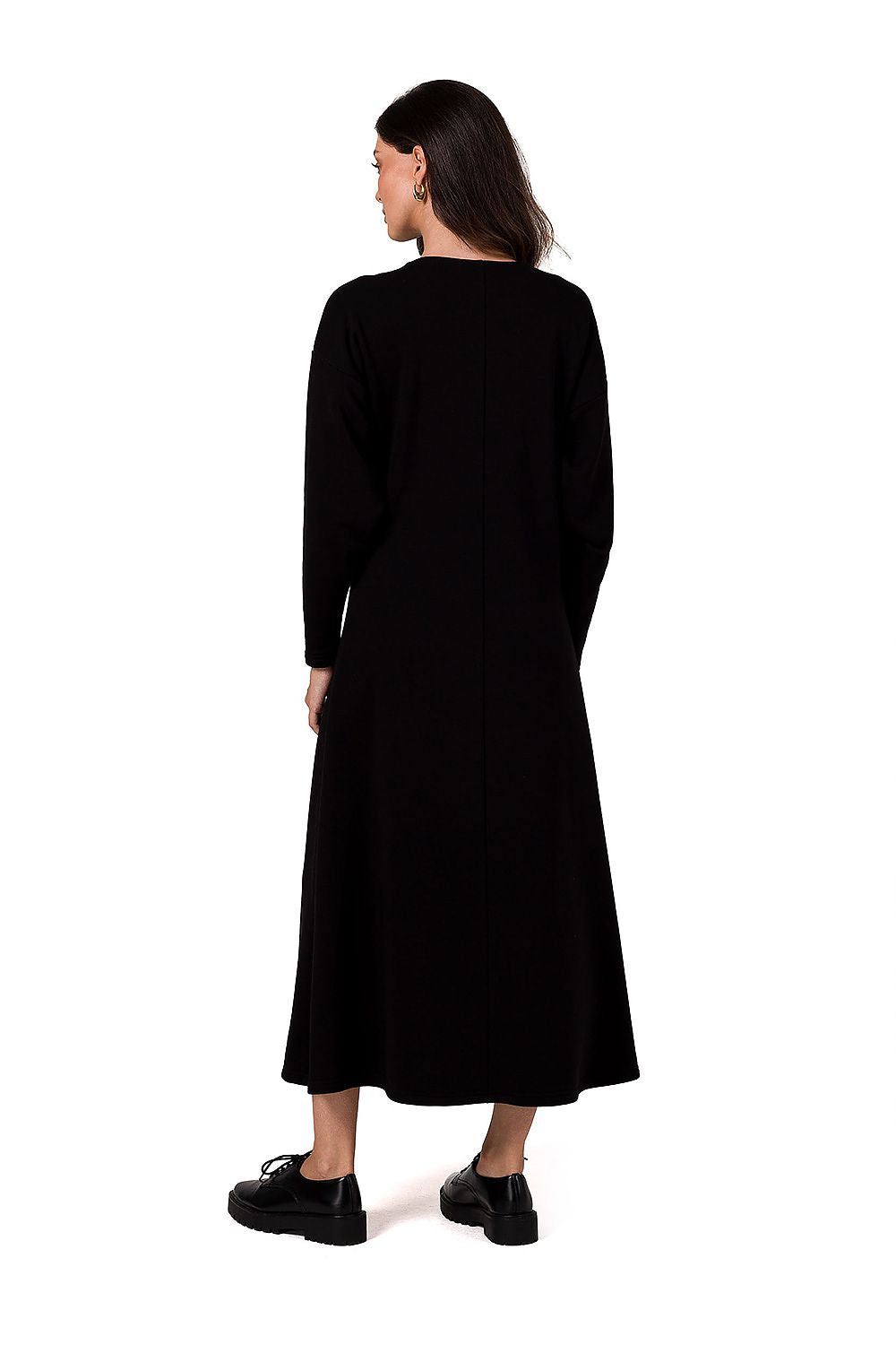 Sophisticated BeWear knitted maxi dress showcased in a stunning deep V neckline and stylish flared silhouette, ideal for chic autumn and winter looks.