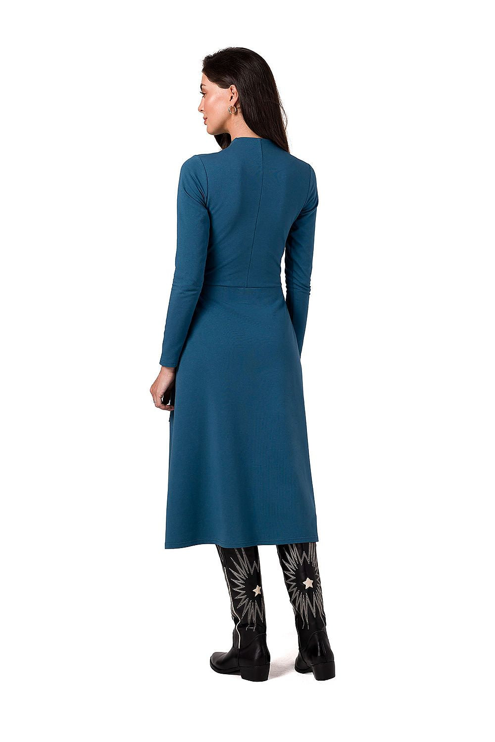 Close-up of the luxurious fabric of BeWear Daydress, highlighting the stylish pleated skirt and contrasting details.