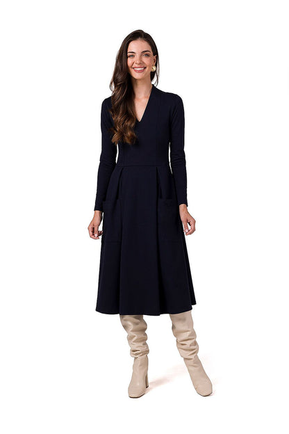 Model wearing BeWear Daydress showcasing the flattering silhouette and over-the-knee length ideal for fashionable outings.