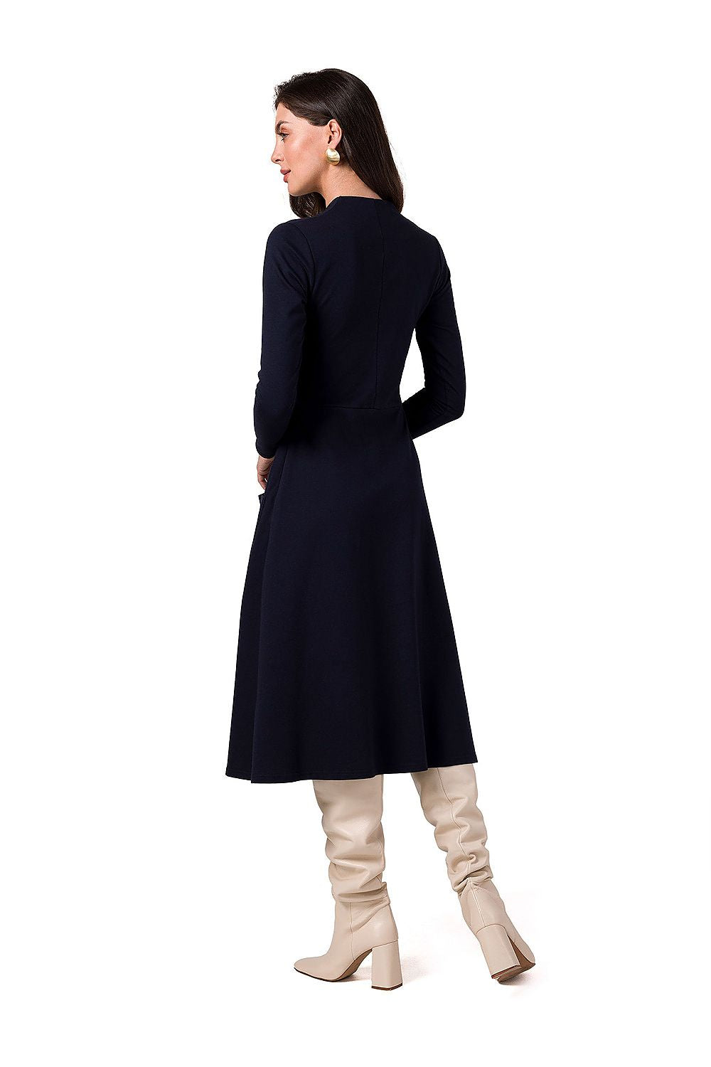 Elegant BeWear Daydress featuring a deep V neckline and chic long sleeves, styled in a luxurious pleated skirt design.