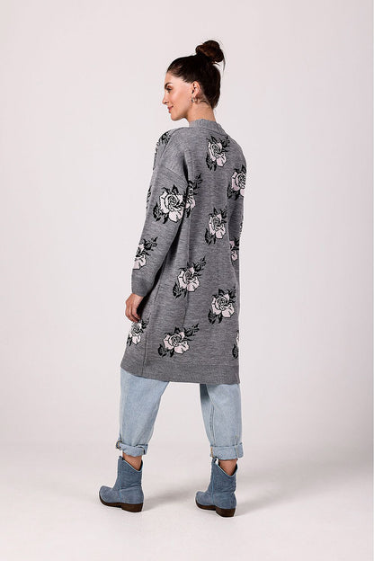 Close-up of the intricate floral design on the beige cardigan by BE Knit, highlighting its casual chic aesthetic.