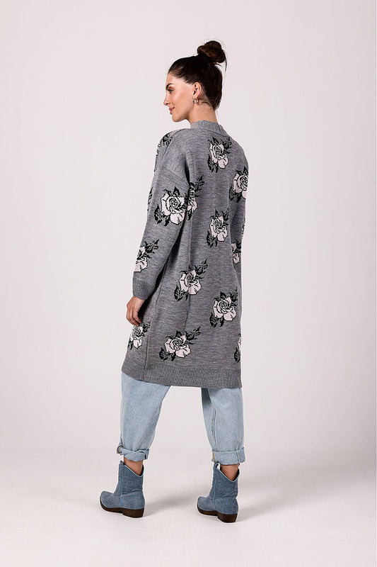 Close-up of the intricate floral design on the beige cardigan by BE Knit, highlighting its casual chic aesthetic.