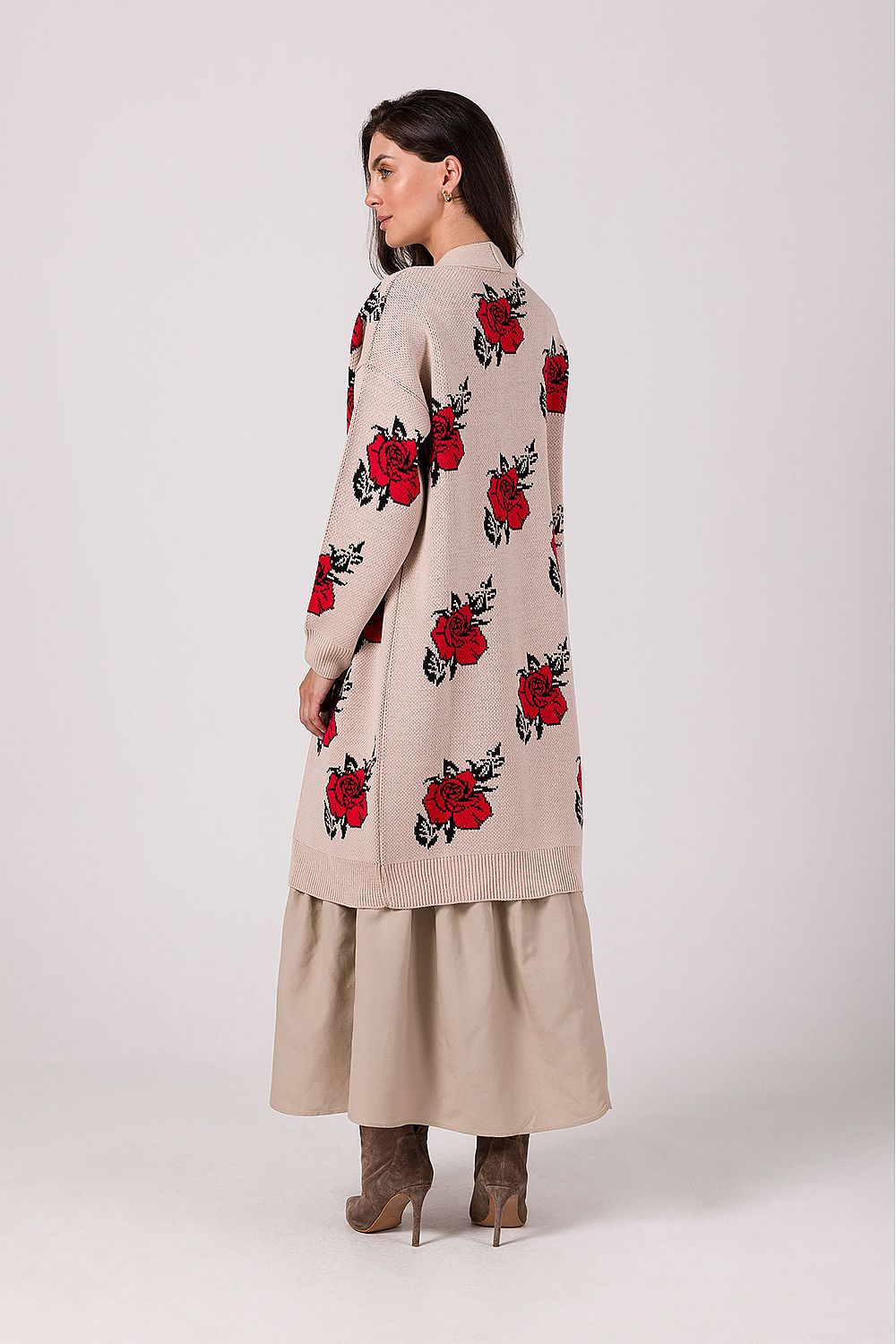 Flat lay of the stylish beige floral cardigan by BE Knit, featuring its soft acrylic texture and relaxed fit, an essential addition to any chic wardrobe.