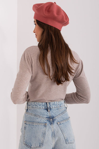Elegant shot of the chic beret on a backdrop, perfectly illustrating its versatile style for sophisticated looks.