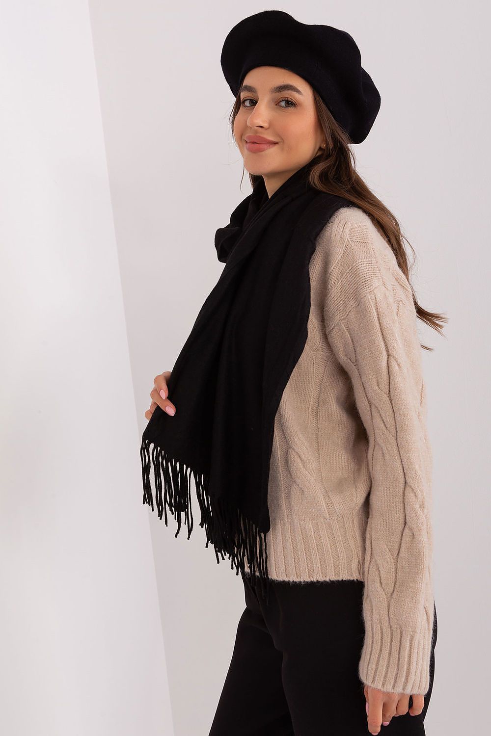 Fashion-forward warm polyester scarf featuring stylish tassels, a must-have for luxurious winter wear.