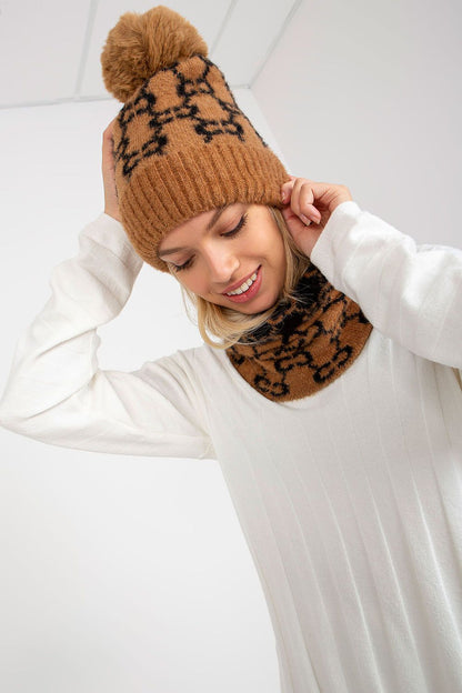 Luxurious plush winter hat with a playful pom-pom design, made from soft acrylic to keep you warm in style.