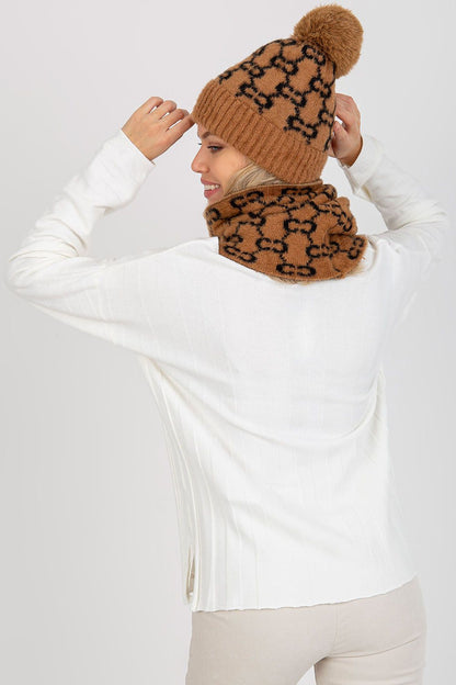 Luxurious 100% acrylic winter cap in rich colour featuring a stylish pom-pom and wide welt design for ultimate warmth in cold weather.