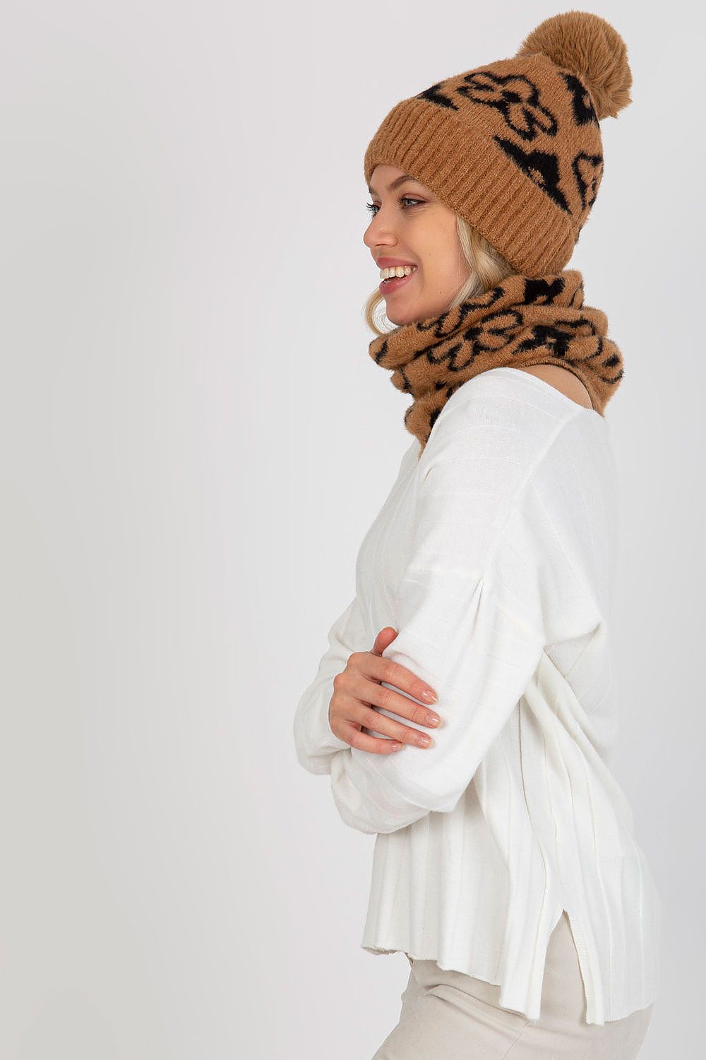 Luxury thick acrylic winter cap in elegant design with pom-pom and wide welt, perfect for stylish warmth during colder months.