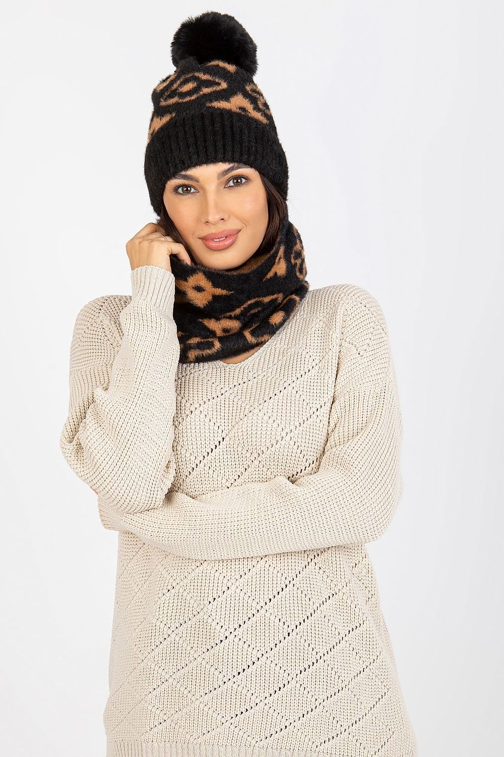 Luxurious acrylic infinity scarf featuring a unique pattern, ideal for stylish winter outfits.