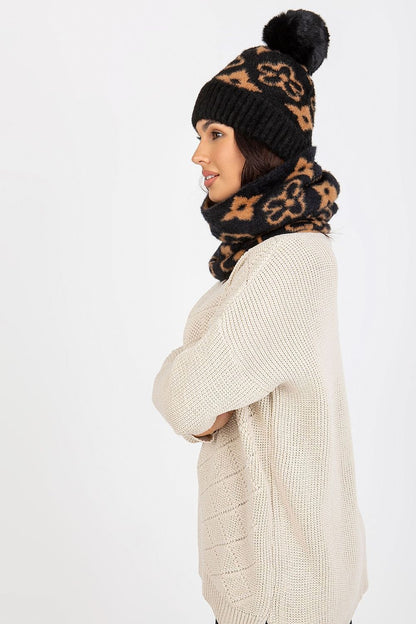 Elegant infinity scarf made from soft acrylic, designed to complement chic ensembles with its distinctive pattern.