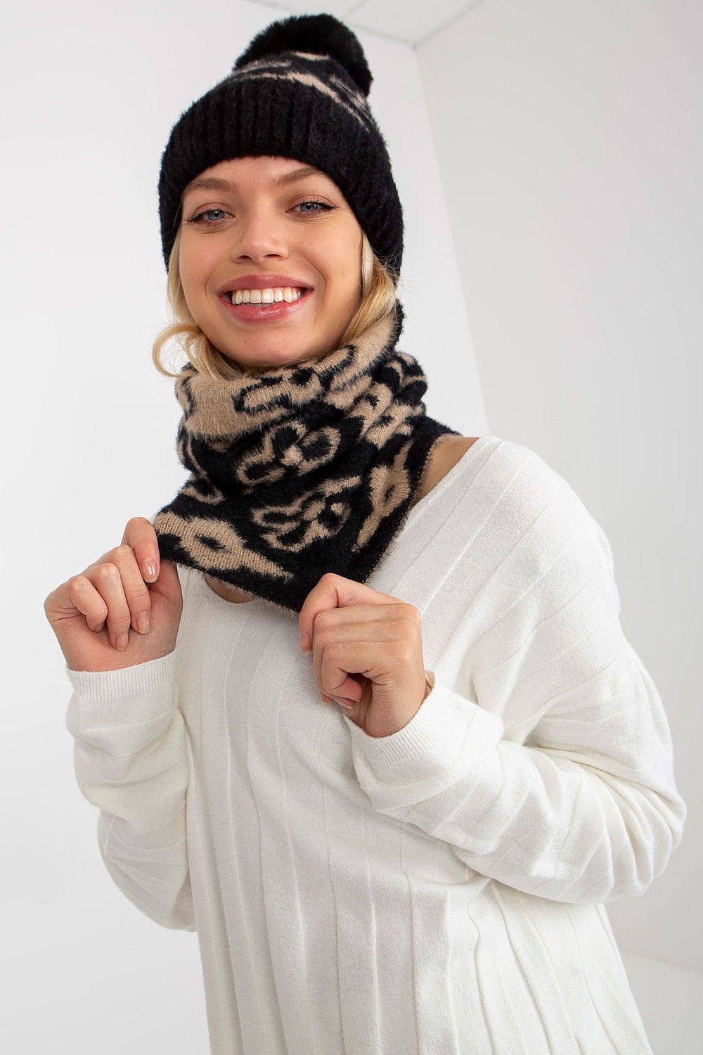 Warm and stylish infinity scarf in luxurious acrylic, perfect for layering with caps of the same color.