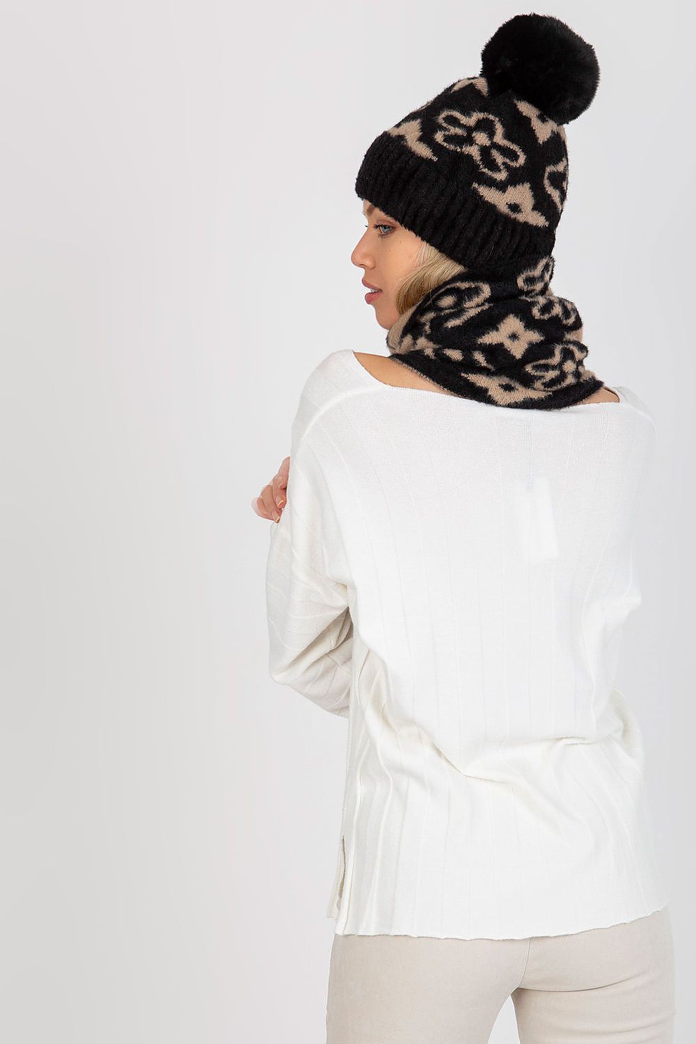 Luxurious 100% acrylic infinity scarf showcasing a unique and elegant pattern, perfect for adding warmth and style to any outfit.