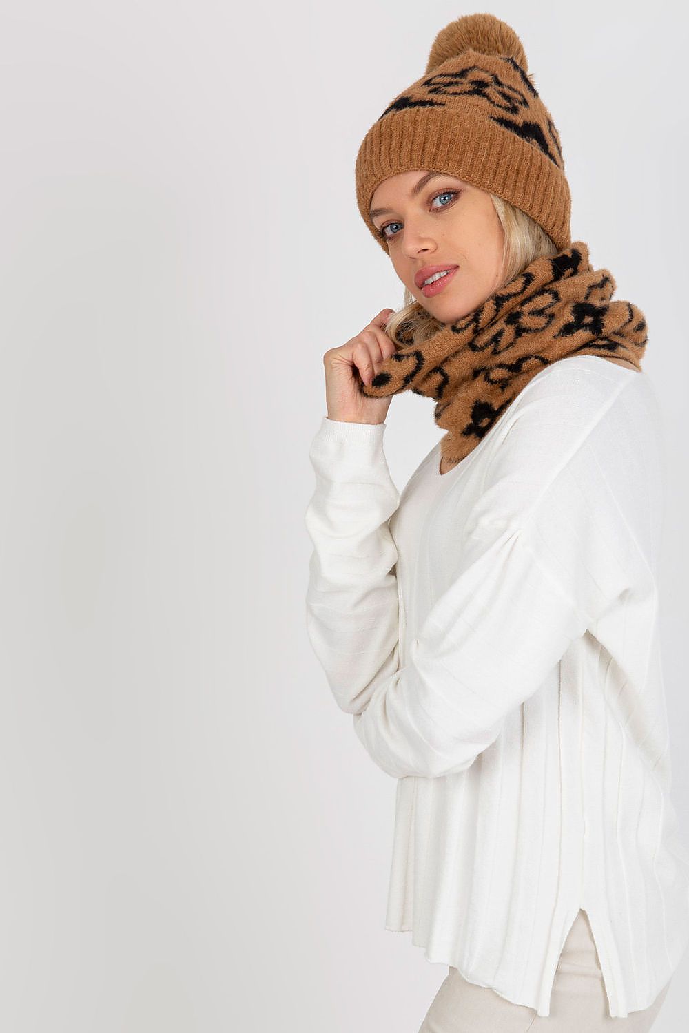 Stylish 100% acrylic infinity scarf displayed elegantly, highlighting its unique pattern, perfect for seasonal outfits.