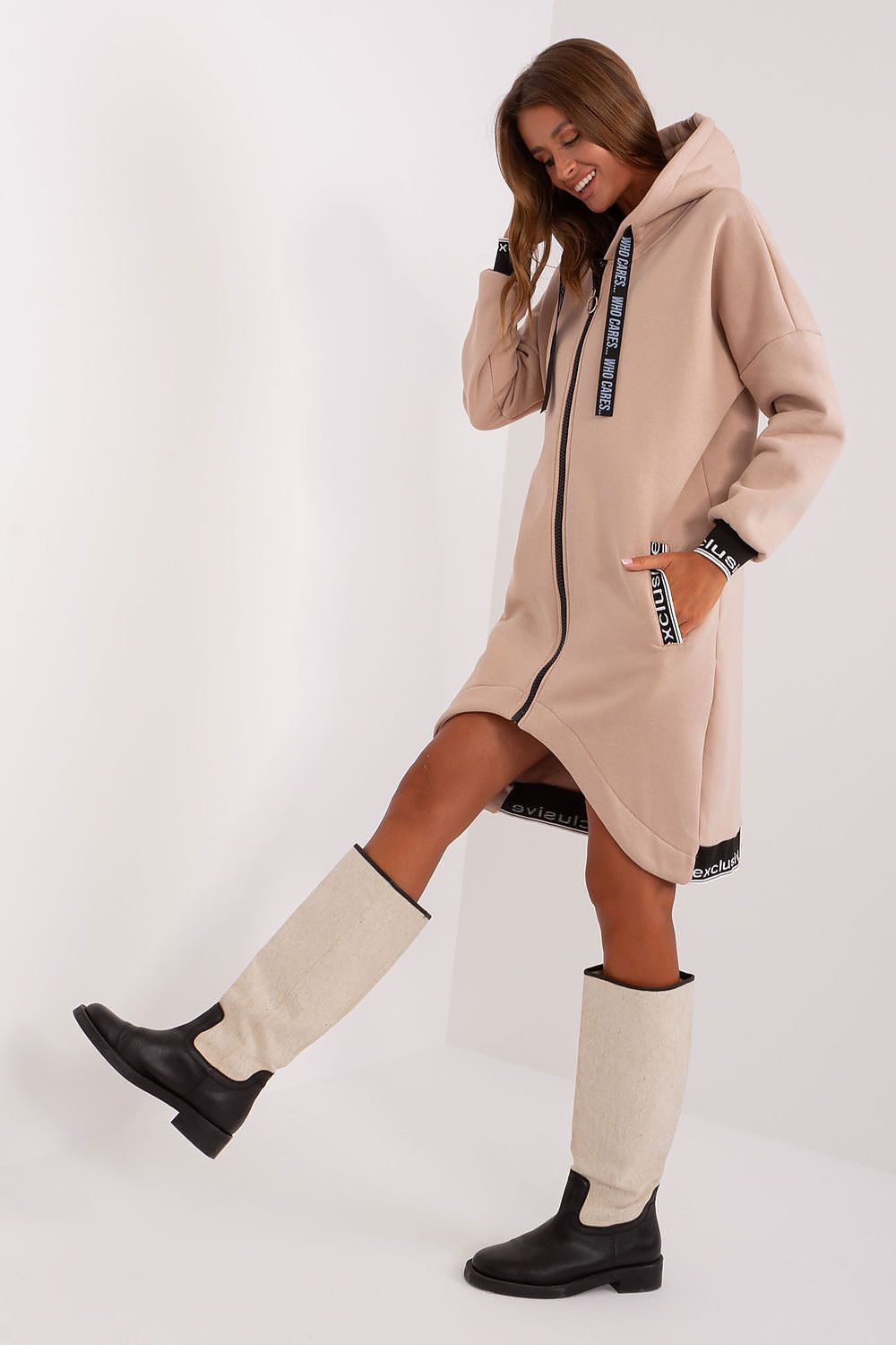 Model wearing luxury cotton blend sweatshirt with hood, demonstrating a fashionable and sporty look perfect for cooler weather.