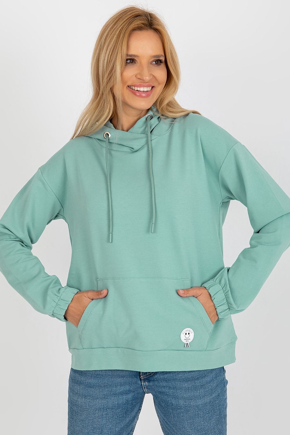 Luxurious cotton-blend hoodie sweatshirt showcasing a stylish kangaroo pocket and distinctive patch, perfect for casual elegance.
