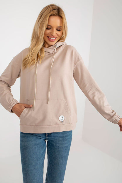 Luxury cotton-blend hoodie showcasing a contemporary patch detail, ideal for fashion-forward individuals.