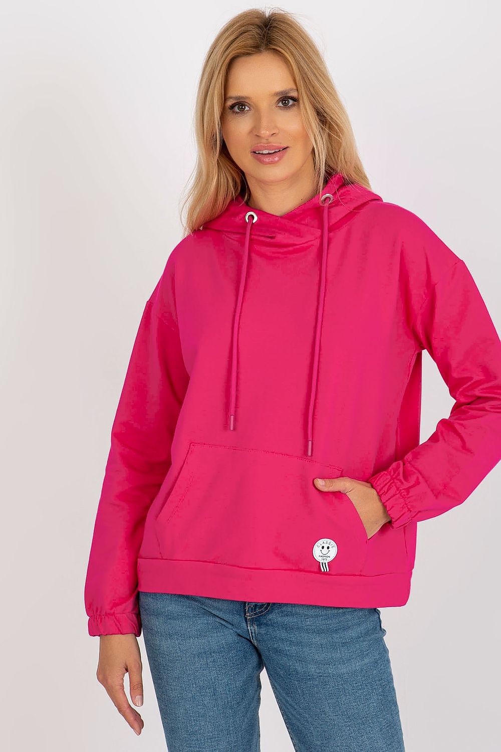Model wearing a fashionable cotton-blend hoodie, showcasing the chic design and comfortable fit, ideal for casual outings.