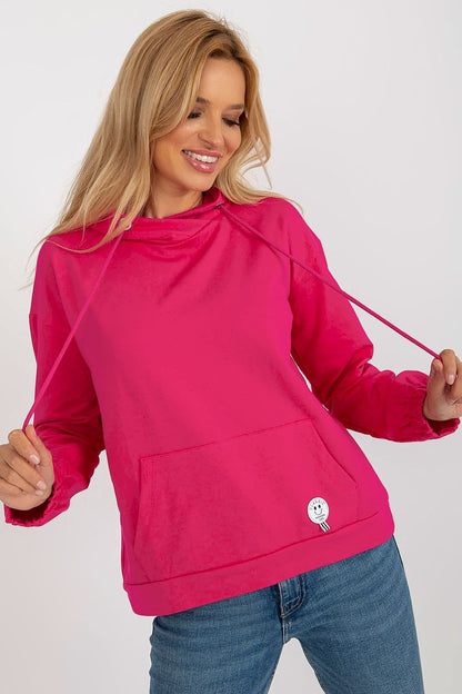 Dramatic angle of a plush hoodie sweatshirt with kangaroo pocket, emphasising its unique style and high-quality fabric.