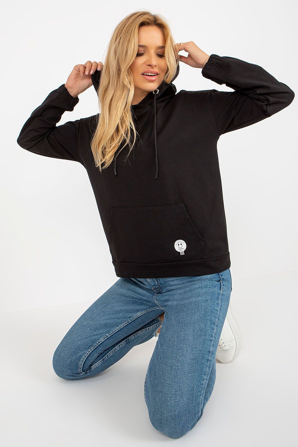 Luxurious comfortable cotton-blend hoodie sweatshirt featuring a stylish kangaroo pocket and distinctive patch, perfect for casual yet sophisticated everyday wear.