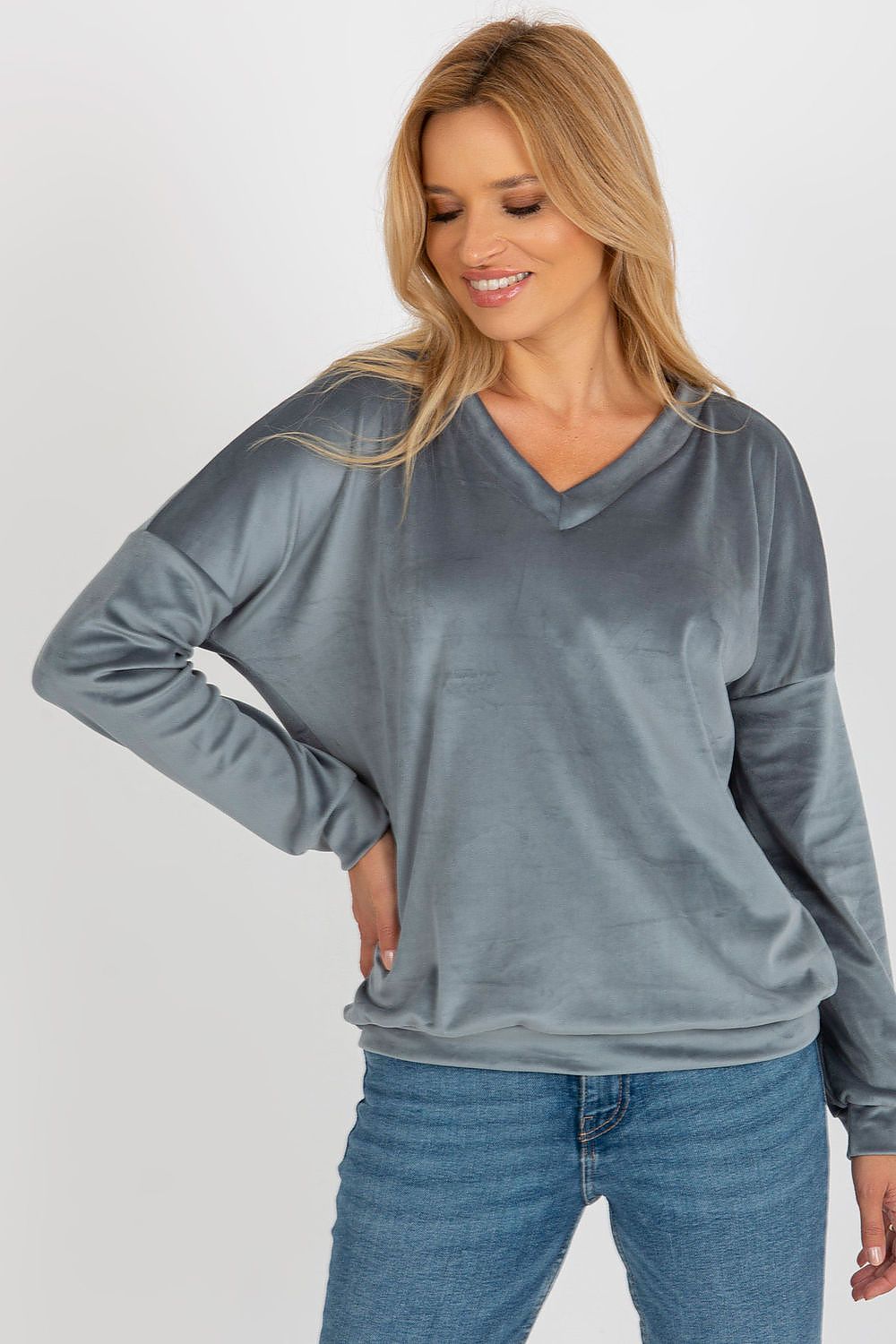 Luxury velour sweatshirt featuring a V-shaped neckline, perfect for elegant casual styling on cold days.