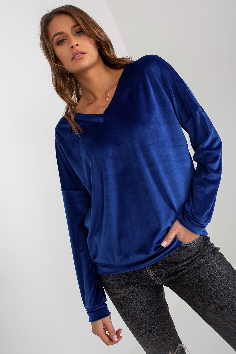 Close-up of soft velour fabric texture showcasing the sumptuous feel and high-quality material of this luxury sweatshirt.