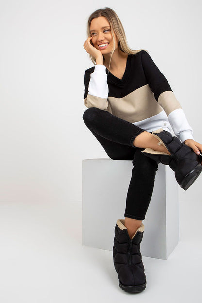 Close-up of the luxurious cotton blend fabric of the Elegant V-Neck Sweatshirt, highlighting its soft texture and intricate colourful design details.