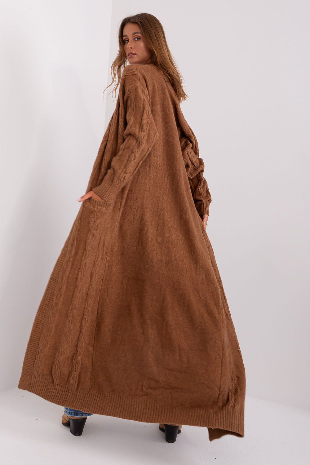 Elegant long-sleeve luxury cardigan made of cozy acrylic blend, ideal for layering and versatile styling.