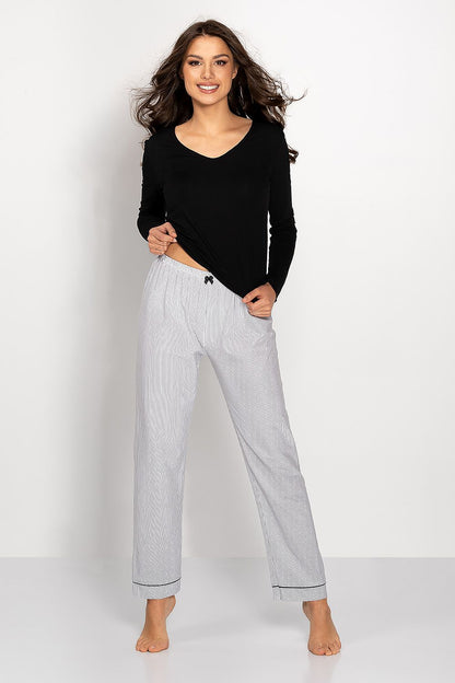 Luxury women's striped pajamas set featuring a long sleeve blouse and loose-fitting trousers, crafted from a comfortable cotton blend, ideal for stylish lounging.