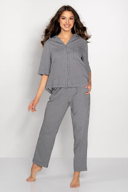 Luxurious checkered women's cotton pajamas featuring a short sleeve shirt and elegant long pants, perfect for stylish lounging.