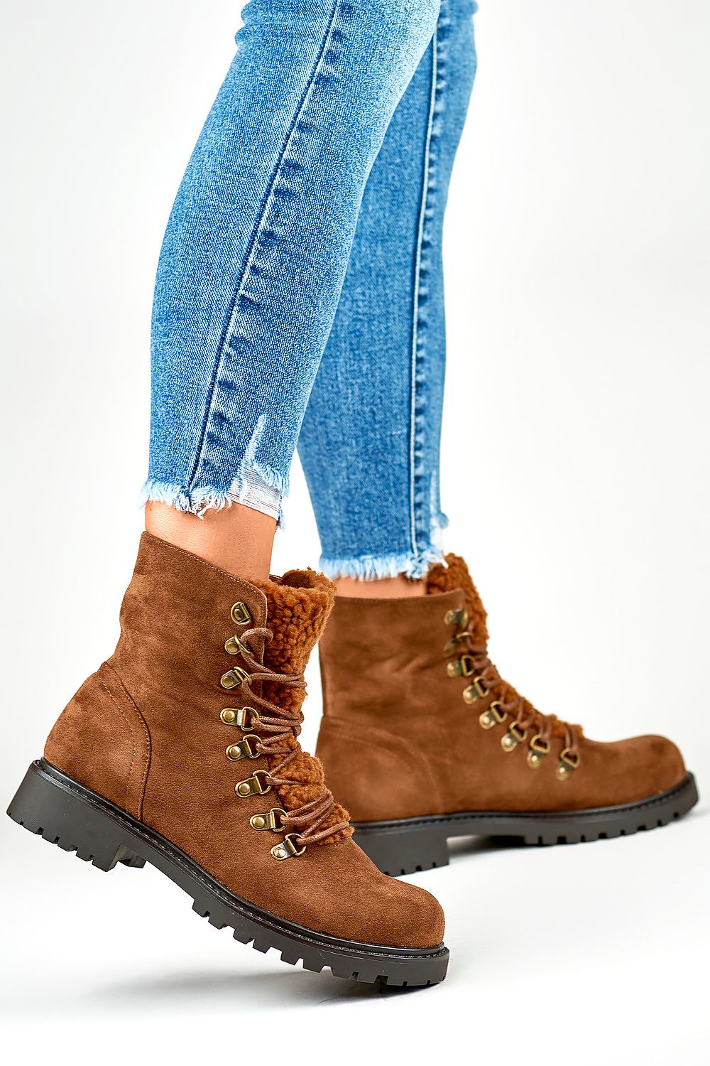 Close-up of PRIMO Brown Suede Booties, designed with soft shoe blanket lining, ensuring warmth and elegance for fashionable women.