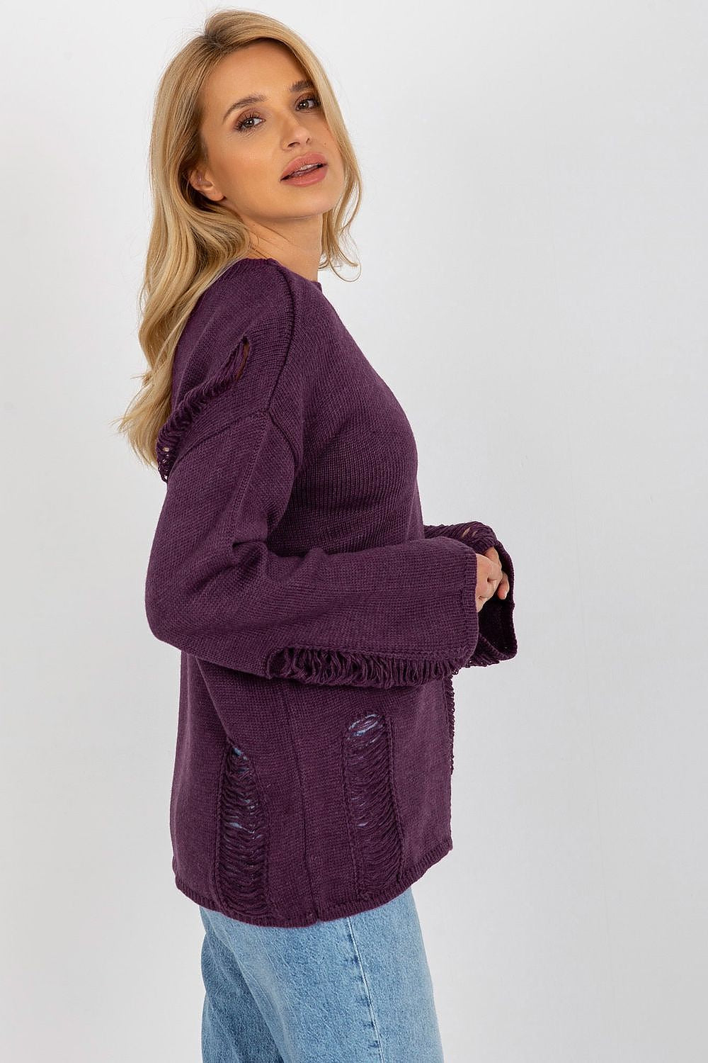 Elegant Badu casual sweater featuring a boat neckline and unique subtle holes, crafted from a luxurious acrylic and wool blend.