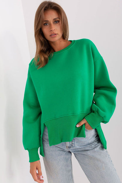 Elegant model showcasing the Ex Moda women's asymmetrical cotton sweatshirt in a casual setting, emphasising its versatility for various outfits.