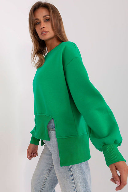 Detail view of the unique asymmetrical hemline of the Ex Moda women's sweatshirt, adding a contemporary touch to classic style.