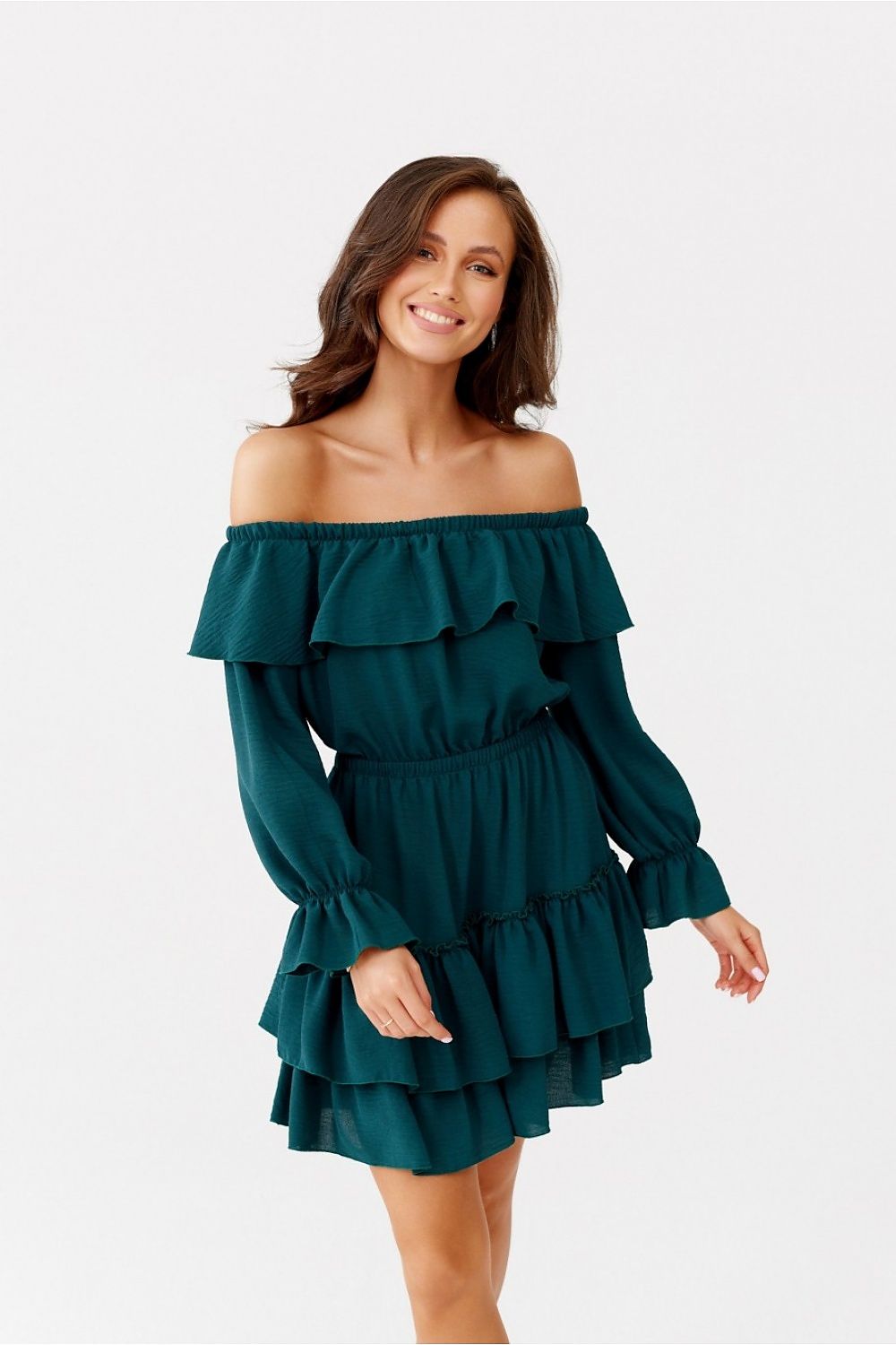 Chic long-sleeve dress by Roco Fashion, designed with ruffles, an elastic waistband, and a flattering knee-length cut for an elegant silhouette.