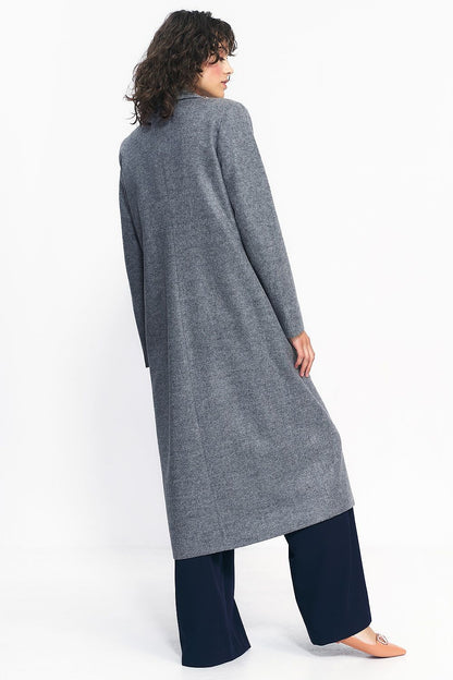 Elegant over-the-knee grey coat with double row fastening, perfect for autumn fashion.