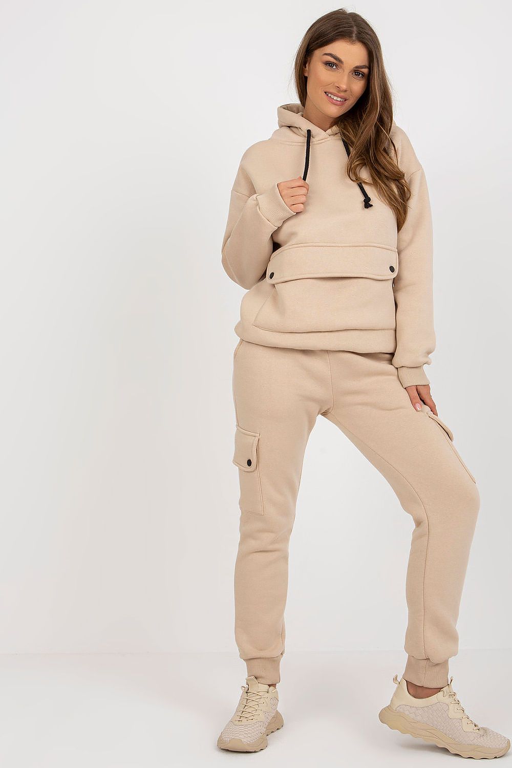 Elegant illustration of a cotton-blend casual set comprising of a warm hooded sweatshirt and practical cargo pants.