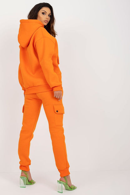 Complete casual outfit displayed on a model, featuring the luxury sweatshirt and cargo pants, ideal for both outdoor activities and relaxed occasions.
