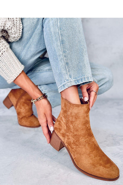 Luxurious Inello women's eco-suede heel boots highlighted by a spacious side zip, complete with plush fur lining for elegant comfort and a chic 5.5cm heel.