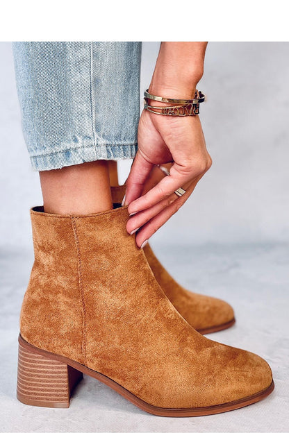 Refined Inello women's eco-suede heel boots featuring a graceful silhouette, side zip closure, and soft fur lining for a stylish and comfortable wear experience.