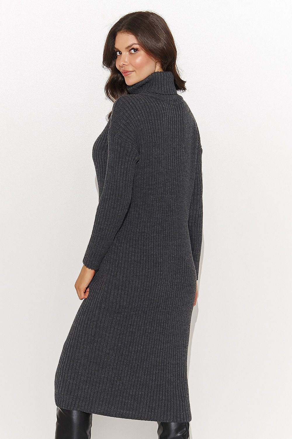 Chic Numinou long sweater dress in dark grey, perfect for layering with coats or jackets for a fashionable look.